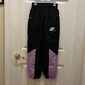 Nike girls nylon joggers. Worn twice in great condition.